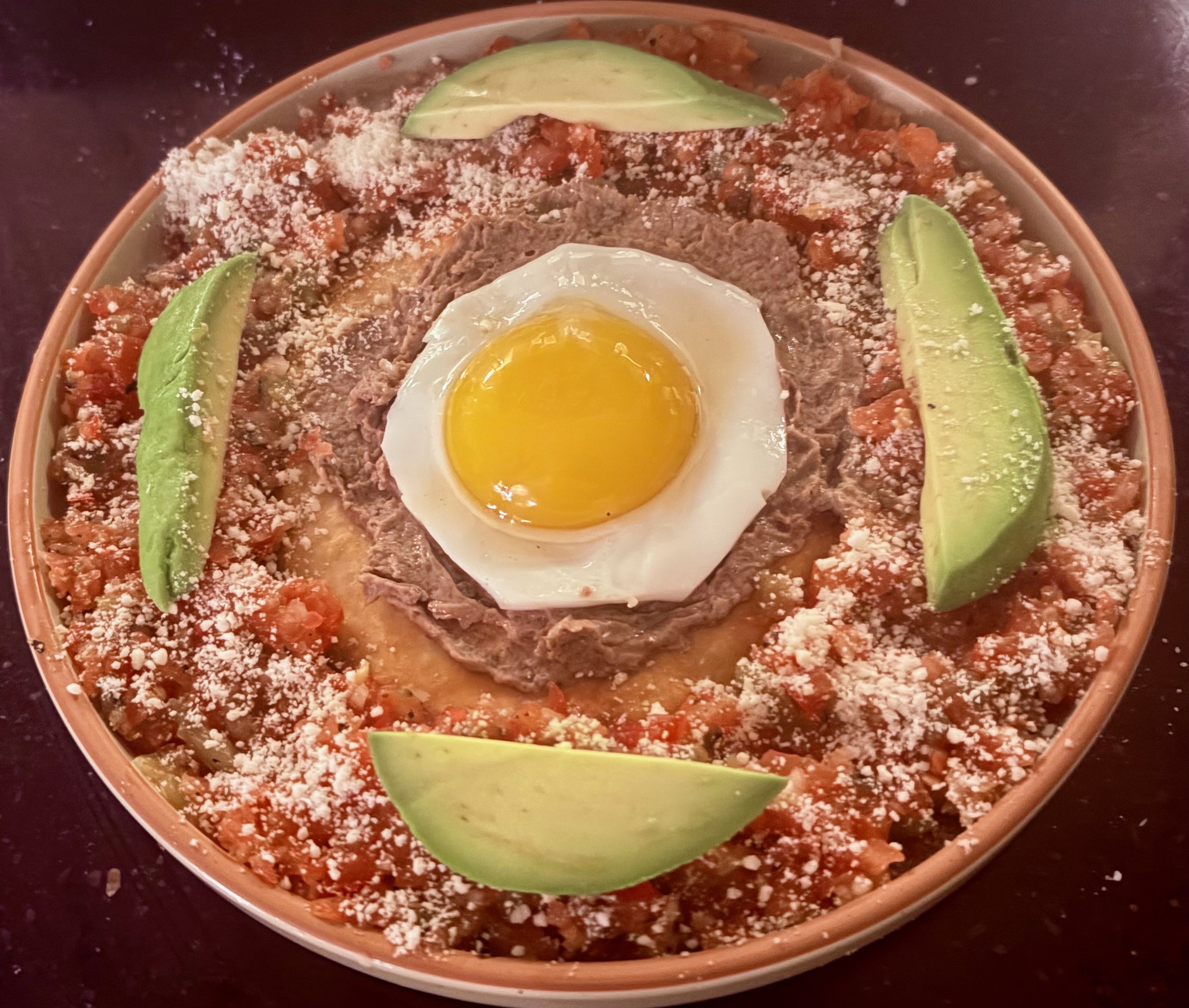 Who's laughing now while eating refried beans and salsa on a bed of crisp tortilla?